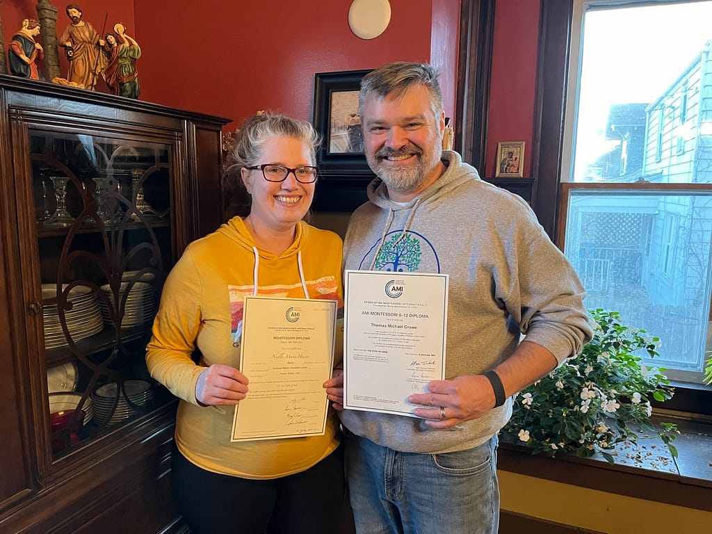Noelle and Tom with diplomas Large | Hilltop Montessori School Noelle and Tom Crowe with their AMI diplomas