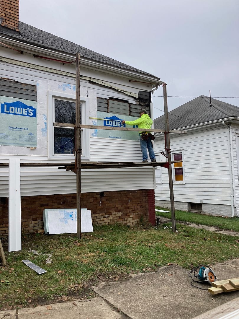 Elementary building being Sided