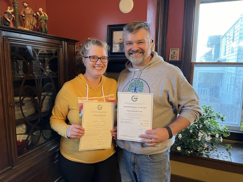 Noelle and Tom Crowe with their AMI diplomas