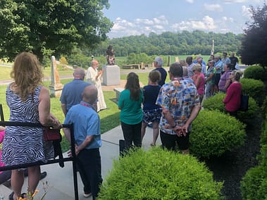 Outside St. Rose with Father Edmund